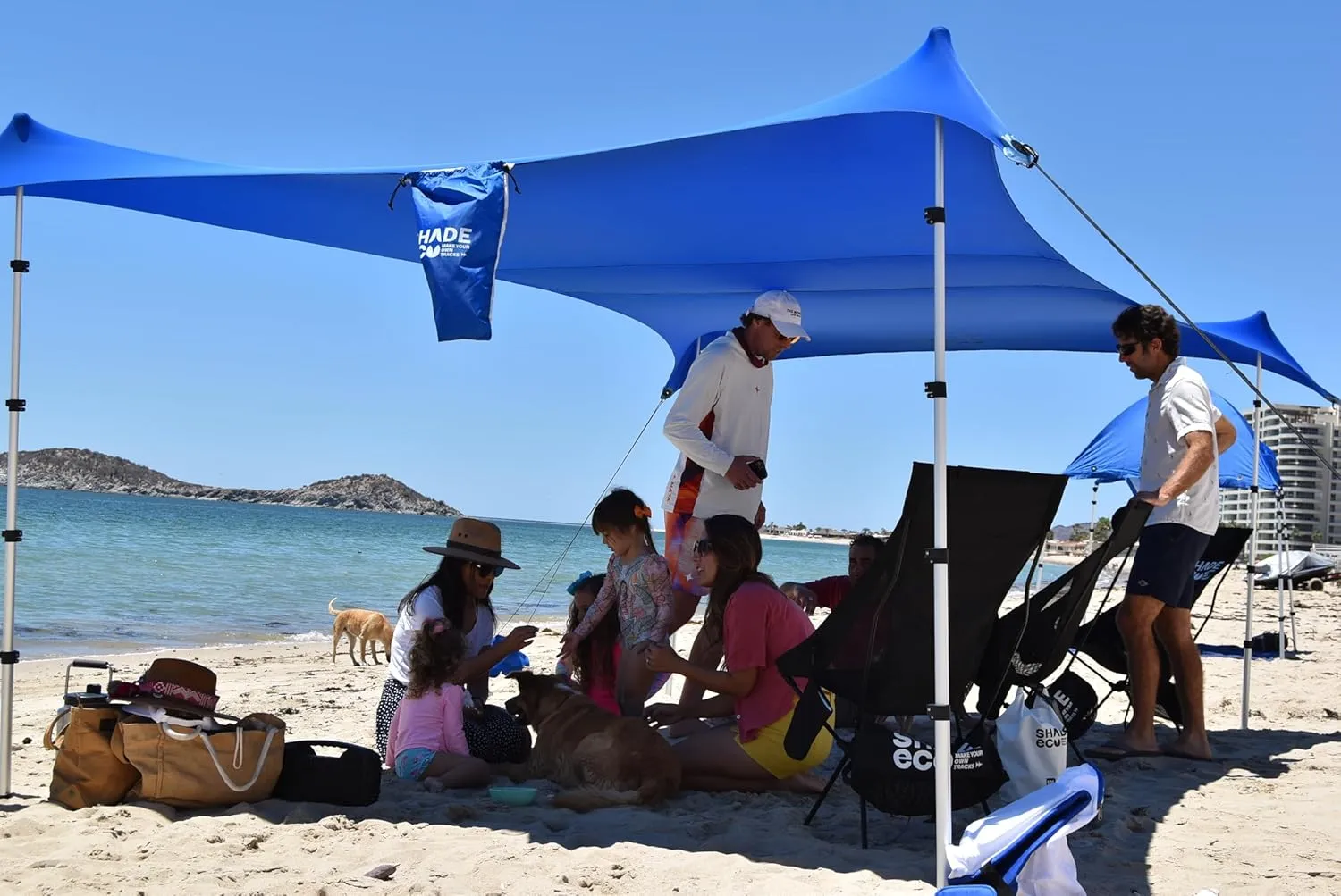 Nomad XL Beach Shade | 15x8.5 ft. Beach Tent Sun Shelter with UPF50  Protection, Adjustable Shade Tent | Quick 5-Min Setup, 25MPH Windproof, Light & Compact, Grass & Sand | 4-Posts